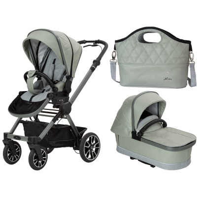 Carrinho de bebé verde claro com saco maternidade e moisés