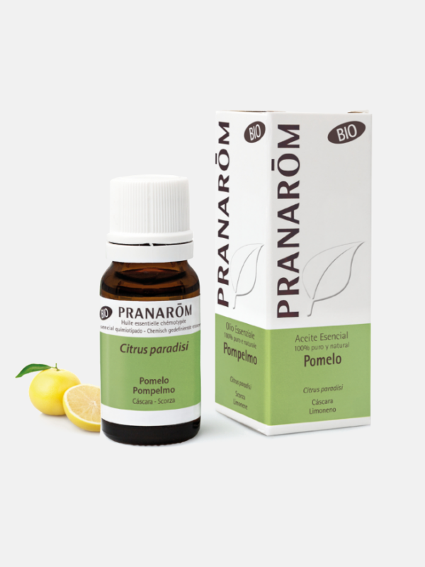 Óleo Essencial de Toranja Pranarom 10ml Frasco de óleo essencial Pranarôm Citrus paradisi Pomelo com caixa e limão cortado ao lado