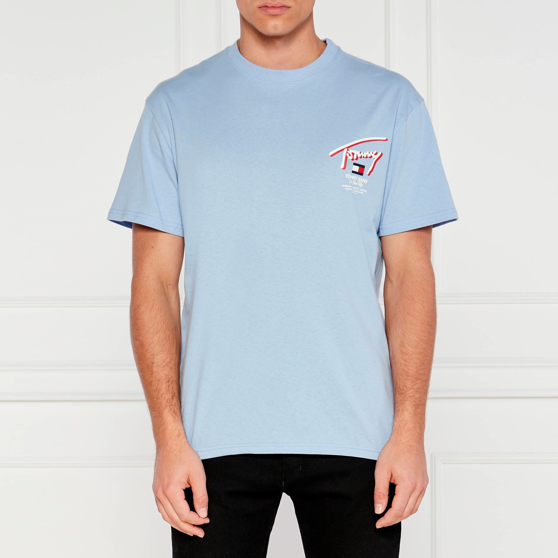 T-shirt azul clara de algodão com estampado no peito com logotipo Tommy Jeans.