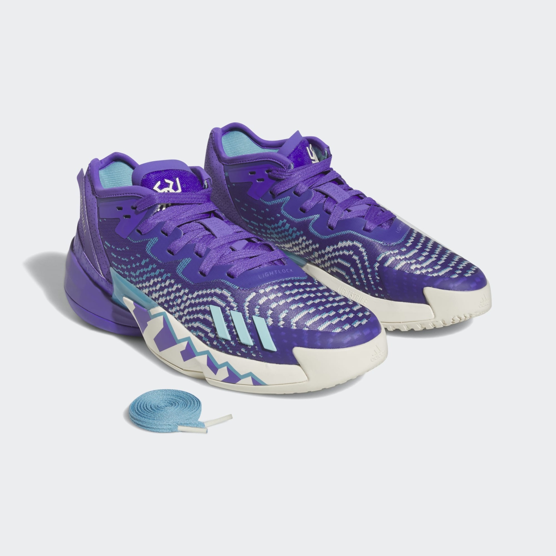 Sapatilhas desportivas roxas com padrão e sola branca e azul claro