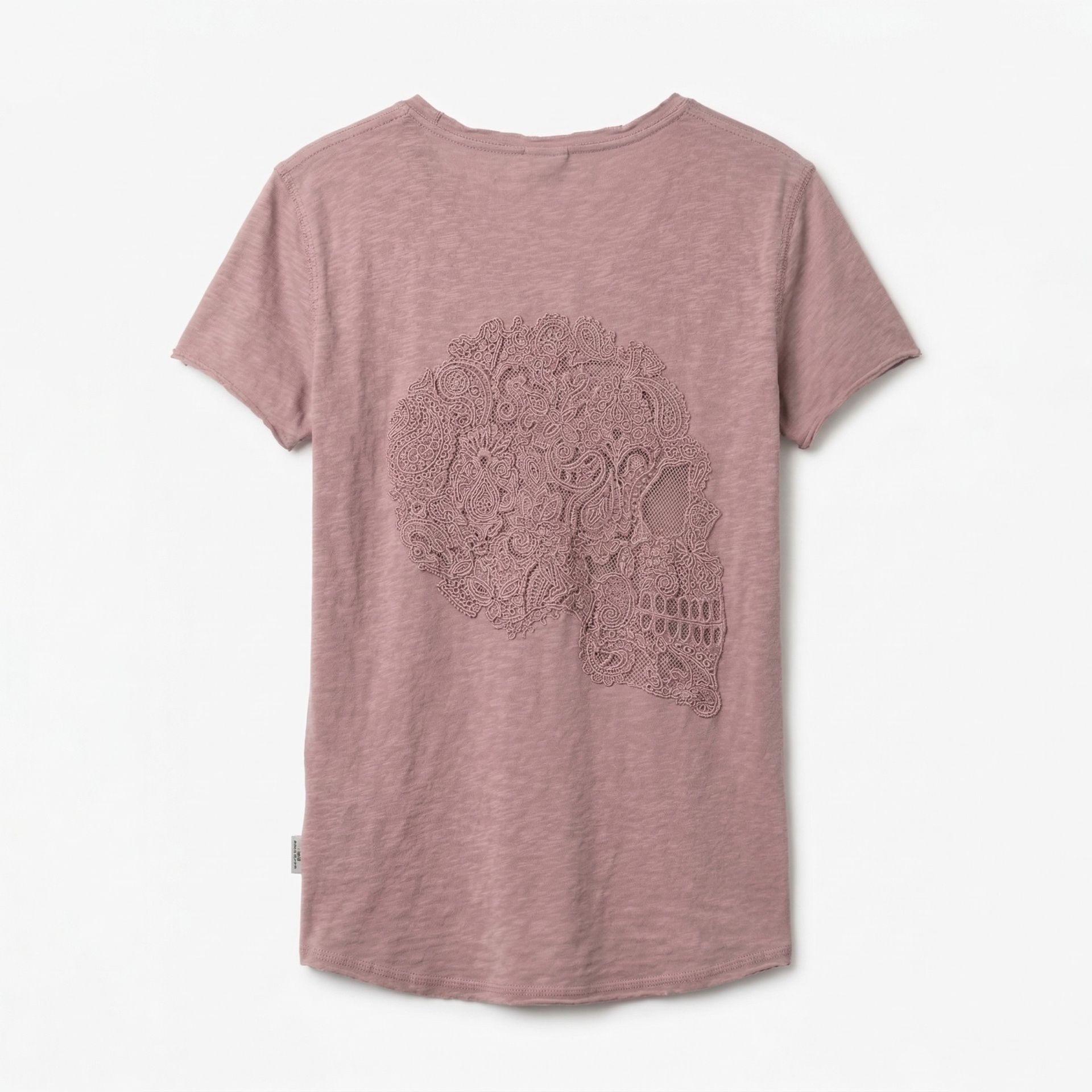 T-shirt rosa claro com design de caveira floral nas costas