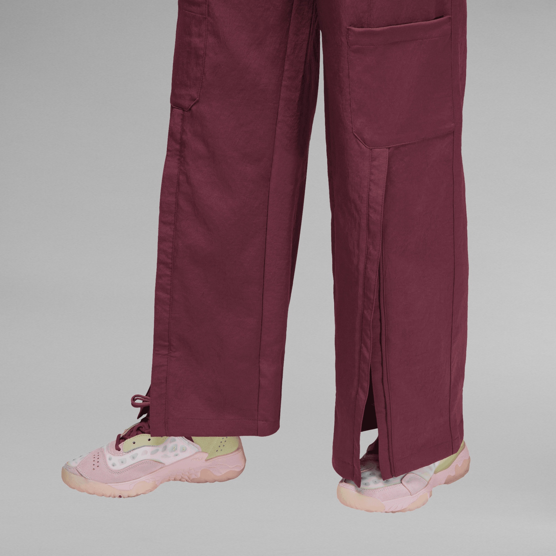 Pantalonas vermelhas vinho compridas com bolso lateral e abertura na bainha