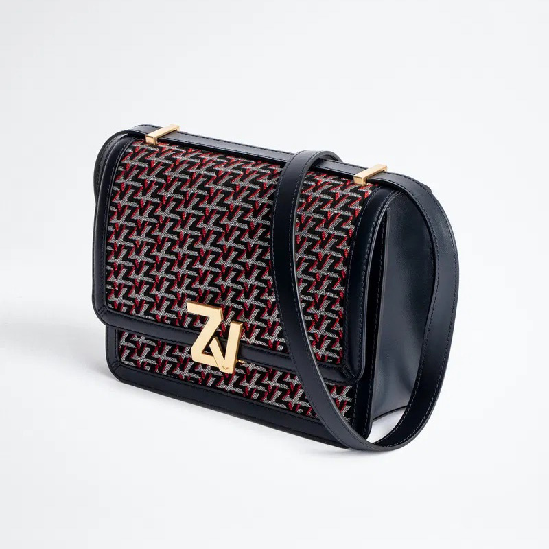 Mala de ombro com padrão geométrico e fecho dourado