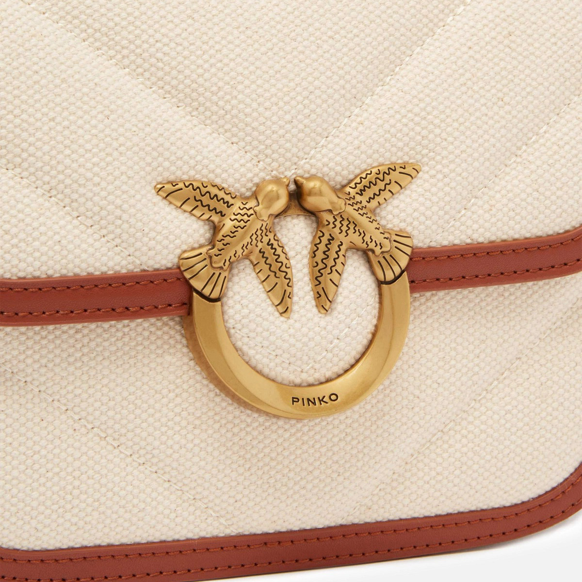 Mala PINKO bege com detalhe em pele castanha e fecho dourado com dois pássaros.