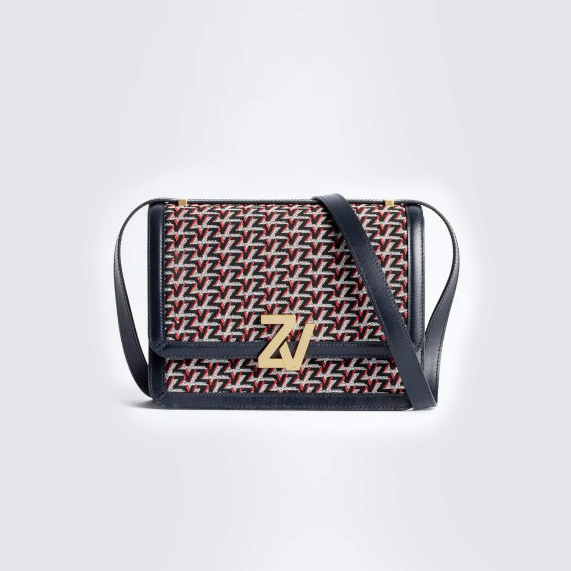 Mala de tiracolo com padrão repetido vermelho, preto e branco e fecho dourado