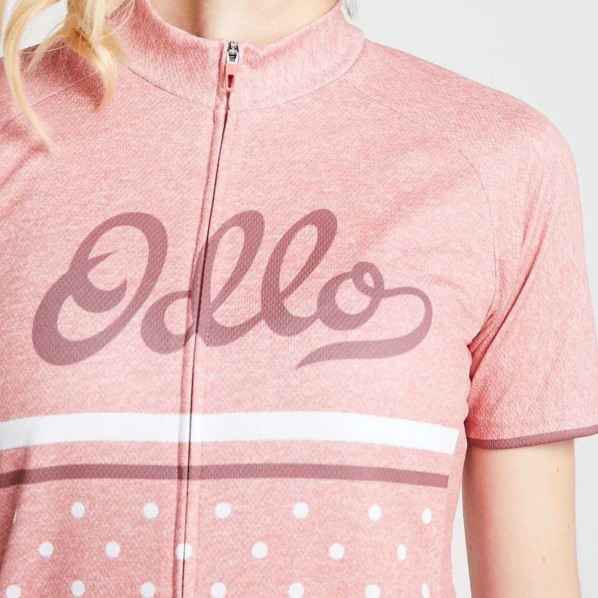 Top feminino rosa com fecho e impressão Odlo no peito