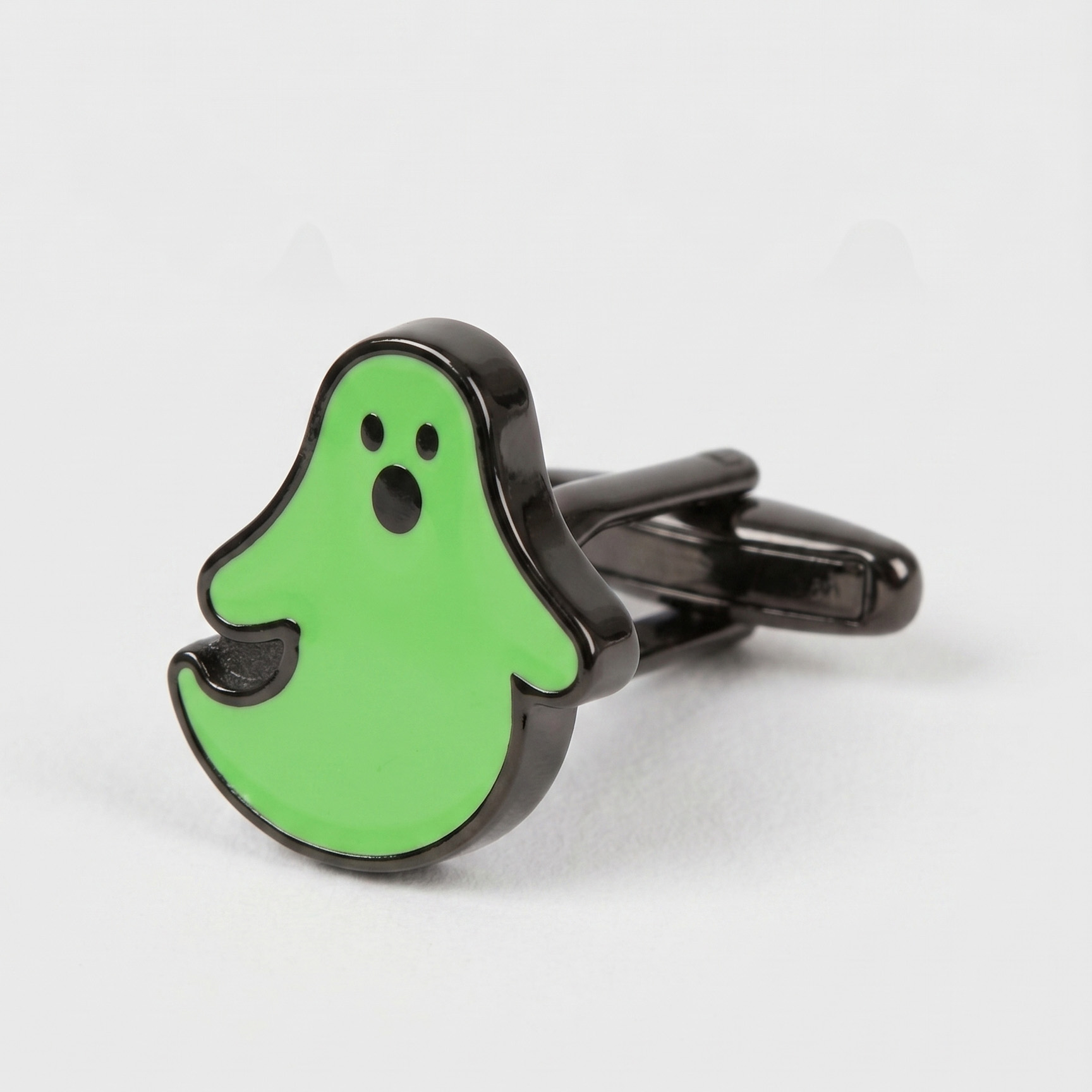 Prendedor de cabelo verde em forma de fantasma com contornos pretos