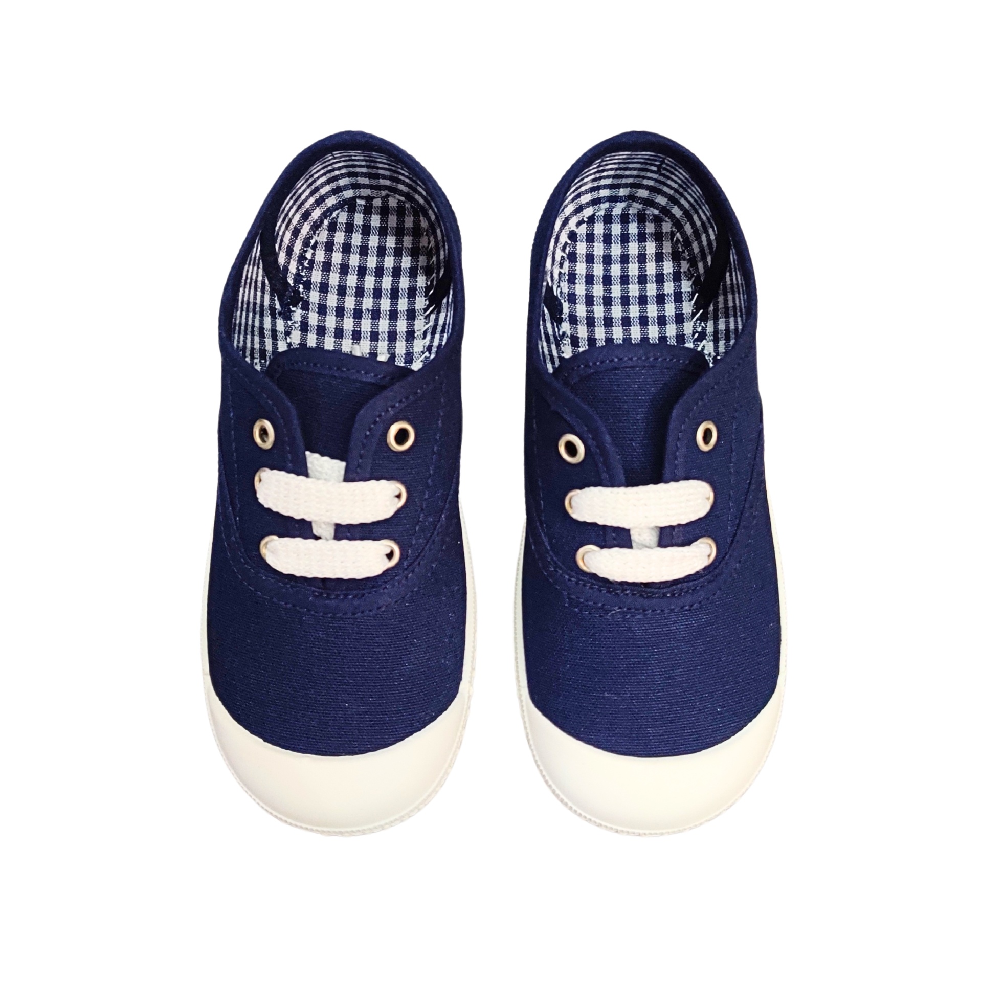 Ténis infantis azuis escuros com atacadores brancos e sola branca