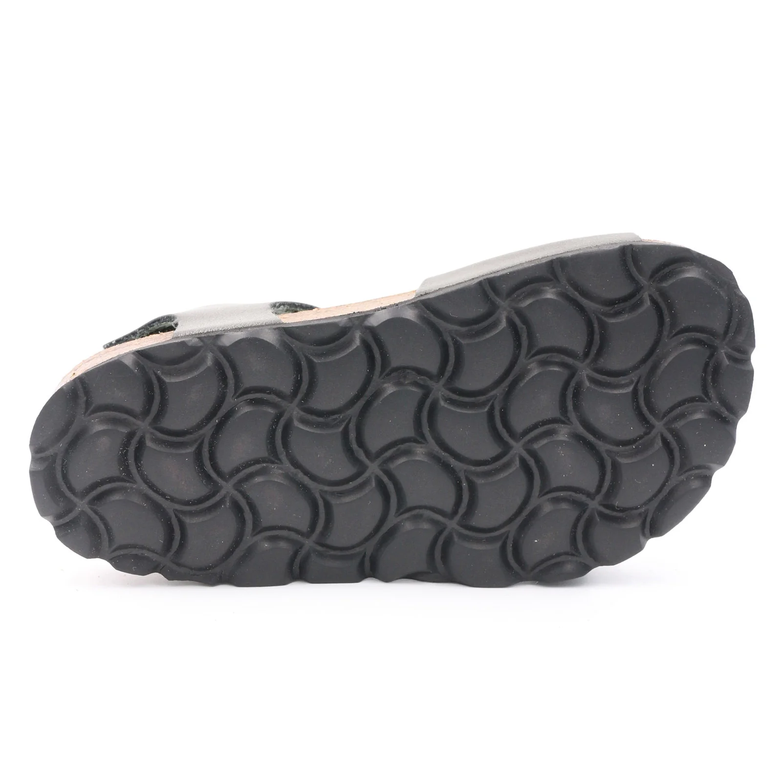 Sola preta de sandália com padrão ondulado em fundo branco