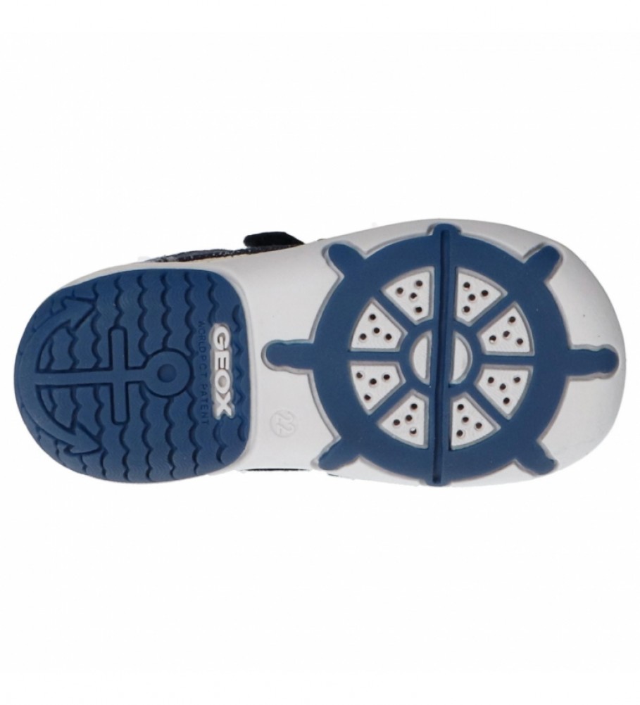 Sola de sapato infantil azul e branca com padrão de leme e marca GEOX