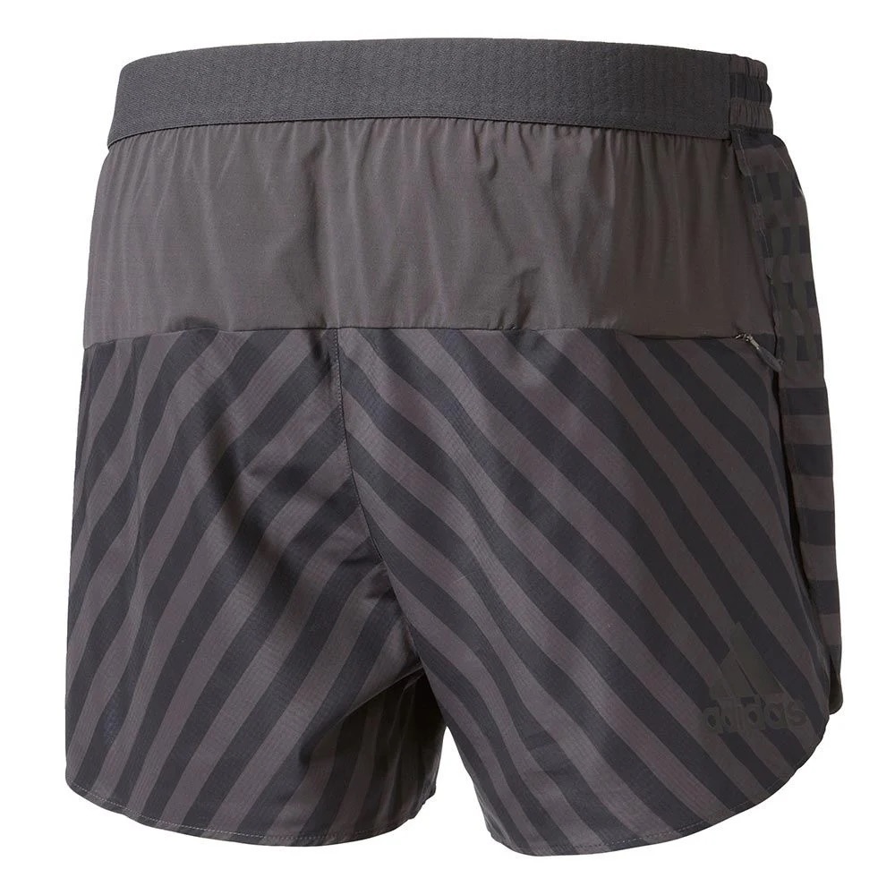 Calções desportivos Adidas cinzentos com riscas diagonais e logo preto