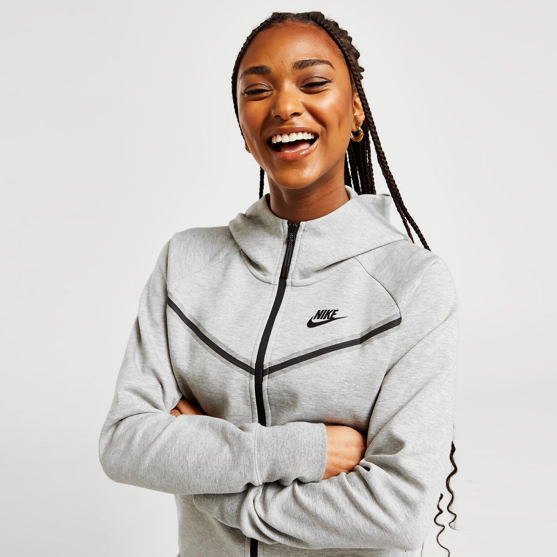 Casaco desportivo cinzento claro com logo Nike preto