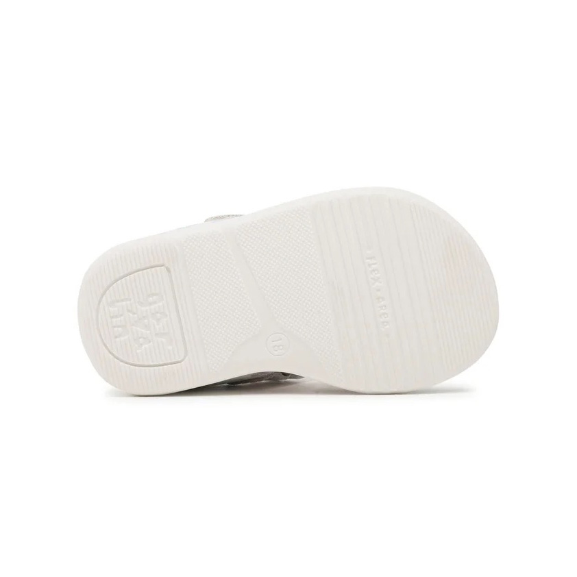 Sola branca de sapato com textura e inscrições