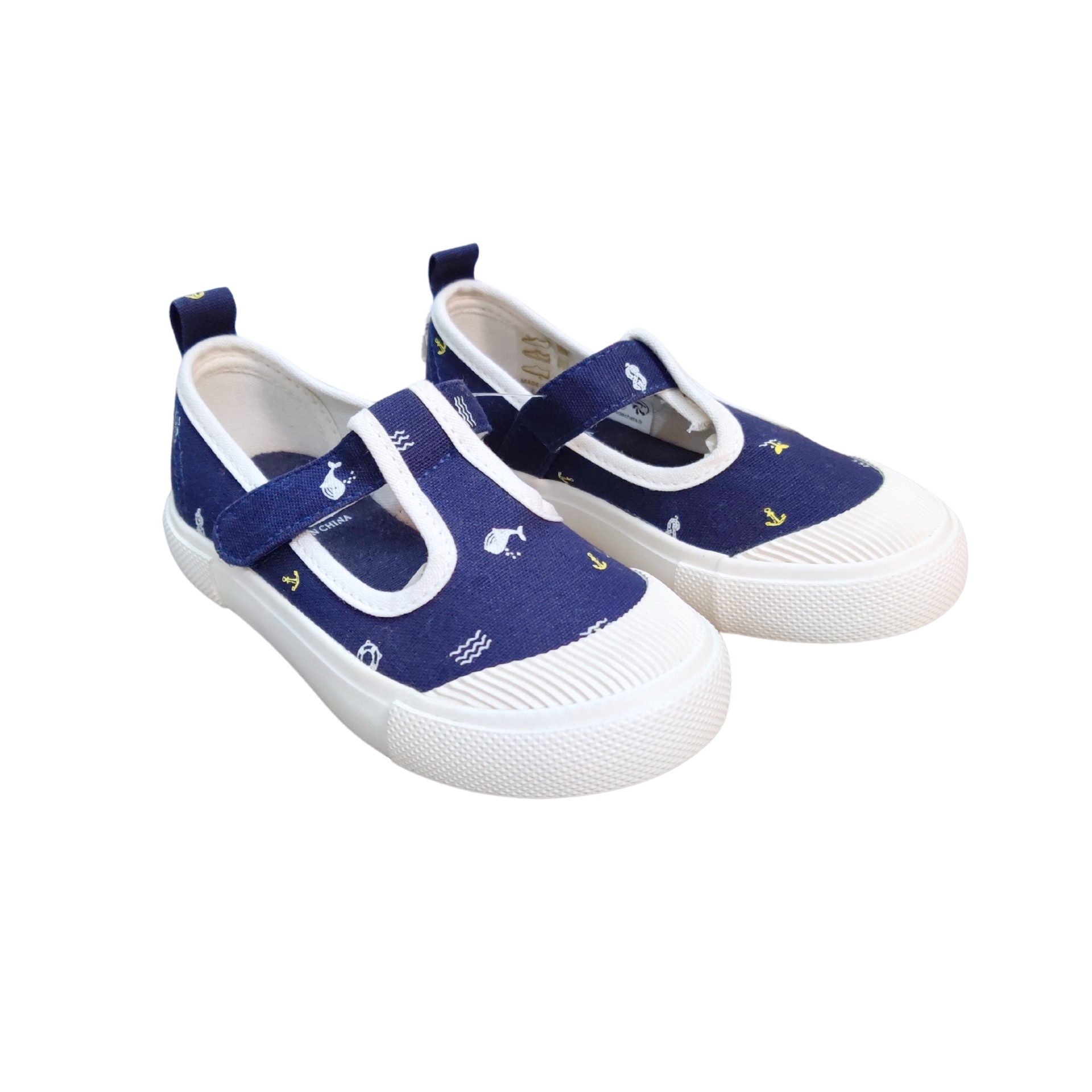 Sapatilhas infantis azuis com padrão branco e amarelo, sola branca e tira de velcro