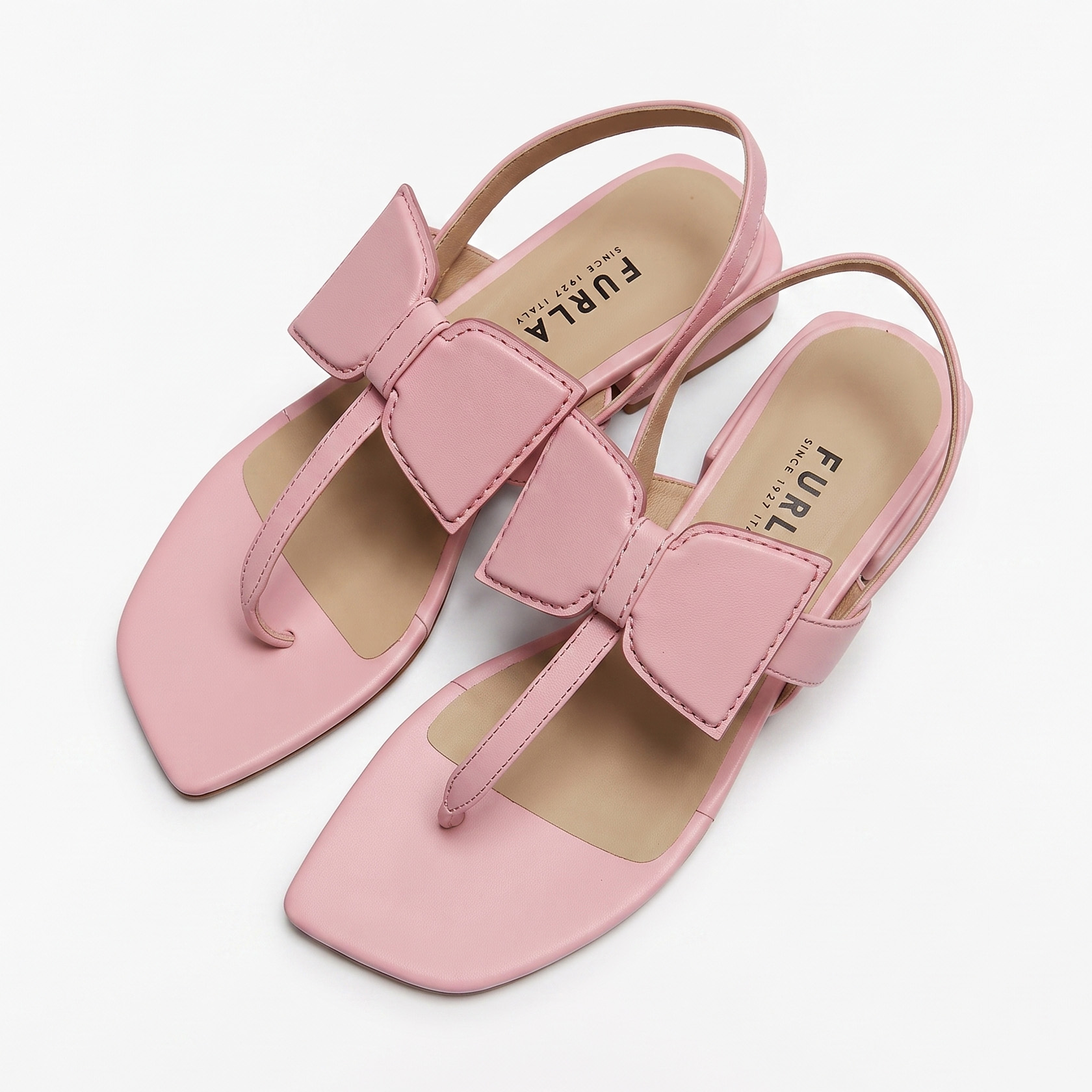 Sandálias cor de rosa com laço e marca FURLA