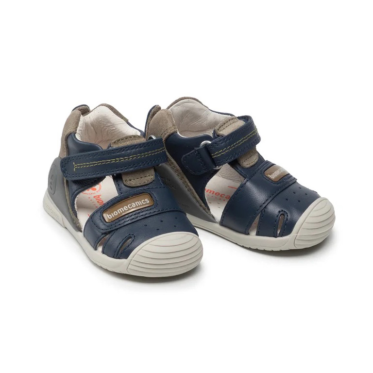 Sandálias de couro azul escuro para criança com fecho em velcro e sola branca