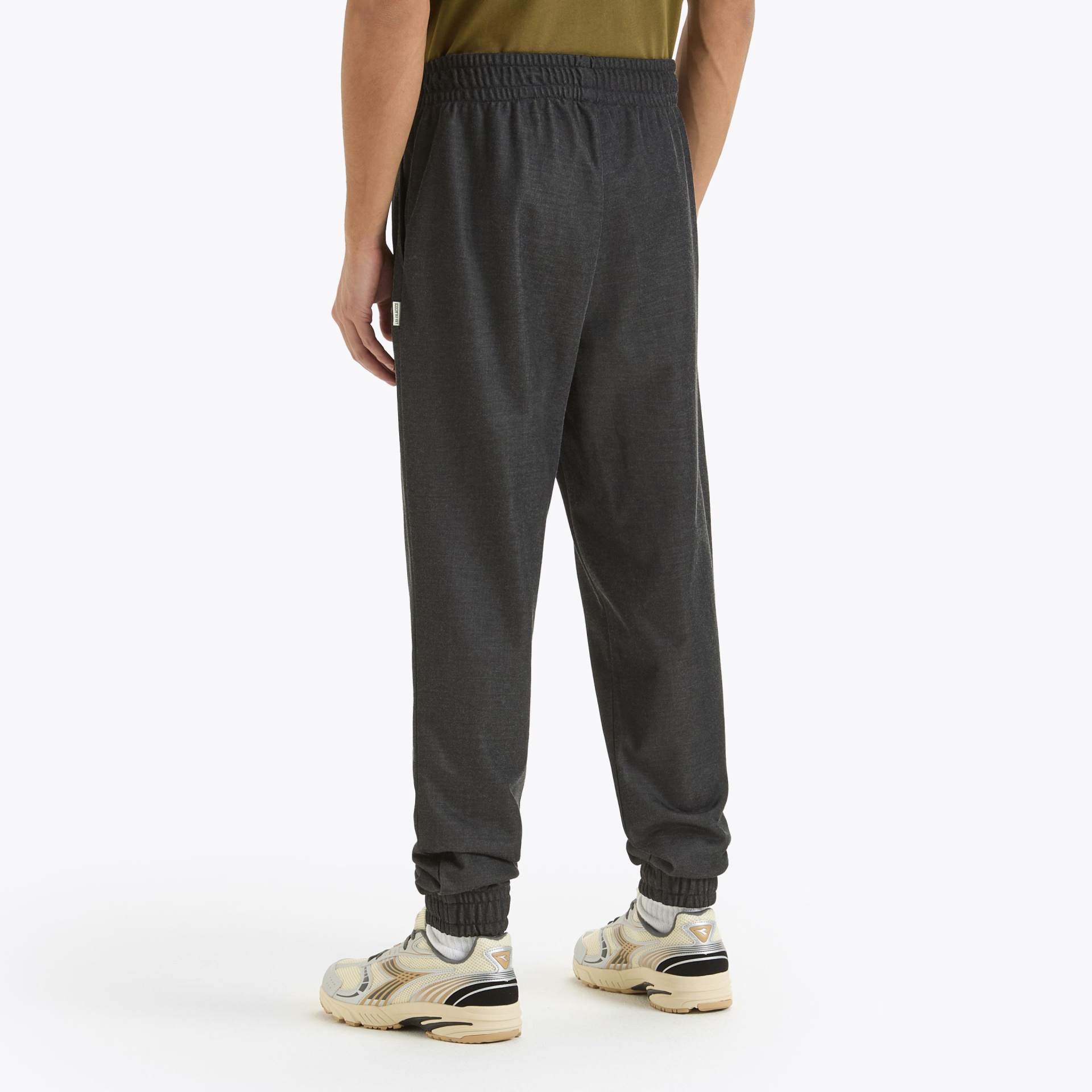 Calças de treino cinza escuro com cós e tornozelos elásticos