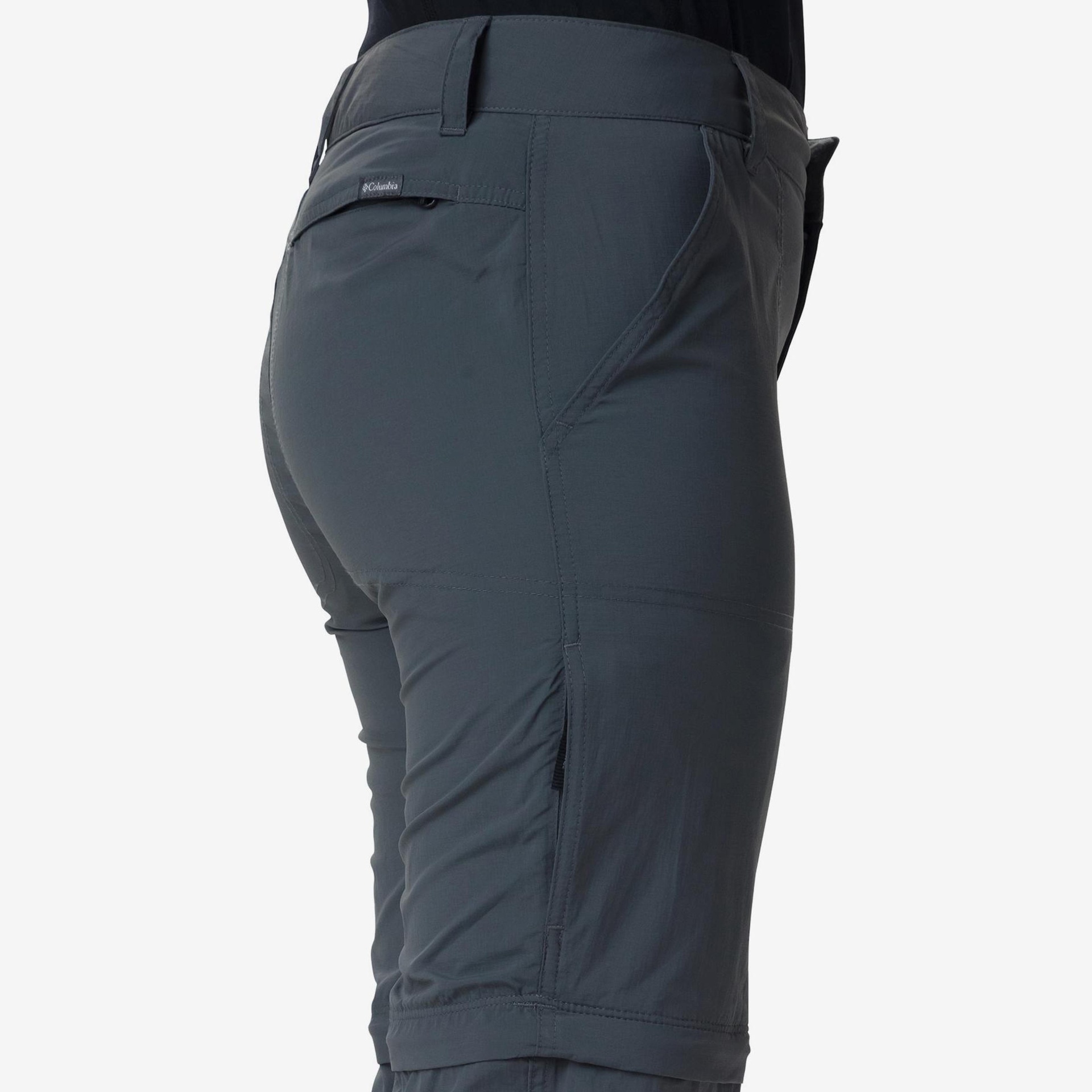 Calças cinzentas Columbia com bolso e etiqueta visível