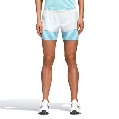 Calções duplos desportivos femininos brancos e azuis com padrão geométrico