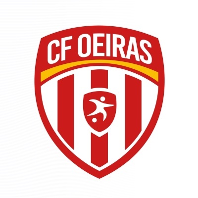 Logótipo do CF Oeiras com escudo vermelho, branco e amarelo e símbolo humano estilizado
