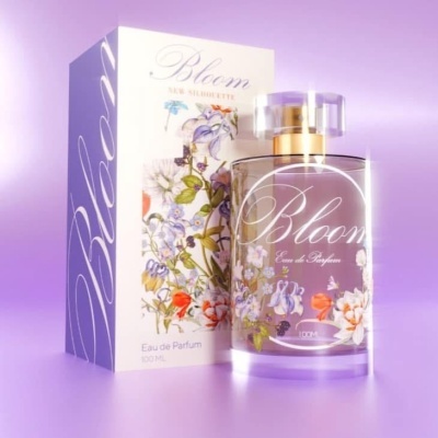 Frasco de perfume Bloom com embalagem decorada com flores sobre fundo lilás.