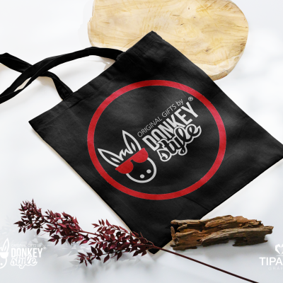 Saco de tecido preto com logótipo DONKEY style em branco e vermelho