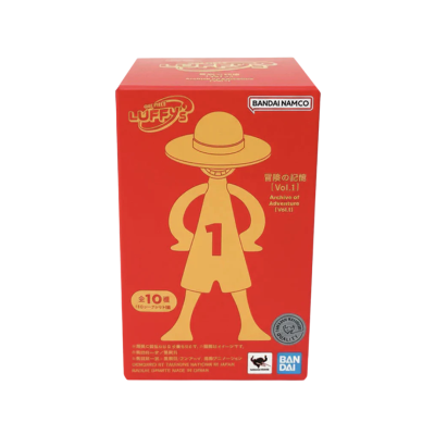Caixa vermelha Bandai Namco com figura humana amarela e chapéu de palha