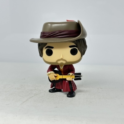 Figura colecionável estilizada com chapéu castanho e guitarra