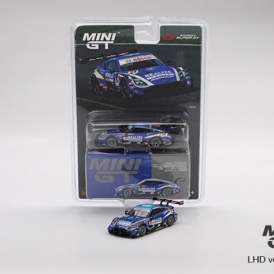 Miniatura de carro desportivo azul preto em embalagem com cartão e imagem do Nissan Z GT500.