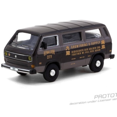 Miniatura de carrinha cinzenta escura com textos em amarelo nas laterais.