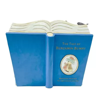 Livro decorativo azul The Tale of Benjamin Bunny com ilustração de coelho e pássaro cinzento