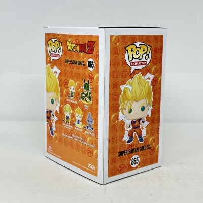 Embalagem Funko Pop Super Saiyan Goku Dragon Ball Z em papel-cartão com fundo laranja e padrão de círculos vermelhos