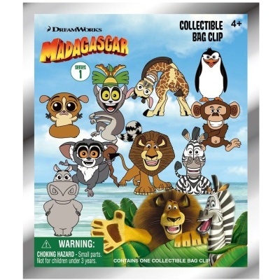 Embalagem azul com personagens animados do Madagascar e texto colecionável, avisos e idade mínima 4+