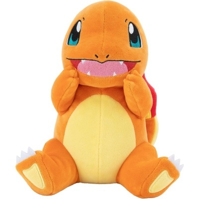 Pelúcia Charmander laranja e amarela com olhos azuis e concha vermelha.
