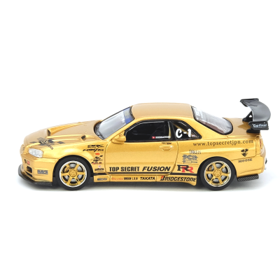 Miniatura de carro de corrida dourado com várias marcas e texto