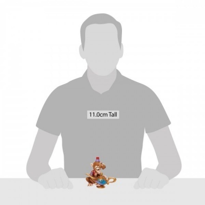 Figurinha colorida de macaco sentada numa mesa branca com texto 11.0cm Tall