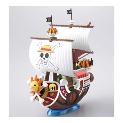 Modelo de navio pirata colorido com velas brancas e caveira