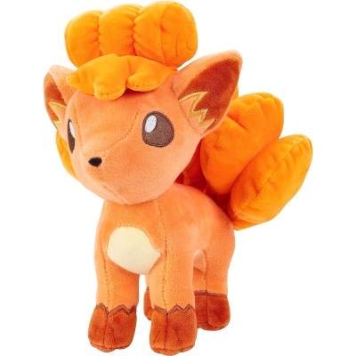 Pelúcia Vulpix laranja com cauda tufada e olhos castanhos