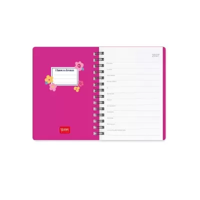 Agenda rosa com flores e texto I have a dream aberta mostrando páginas internas para dados pessoais e ano 2027