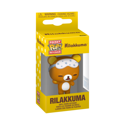 Caixa amarela com figura Rilakkuma castanha e branca com máscara azul claro com estrelas