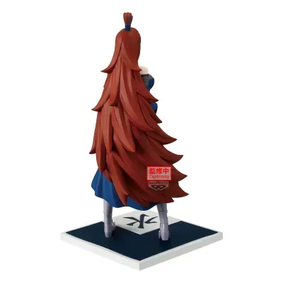 Figura de personagem feminina com cabelo longo castanho-avermelhado e vestido azul sobre base quadrada.