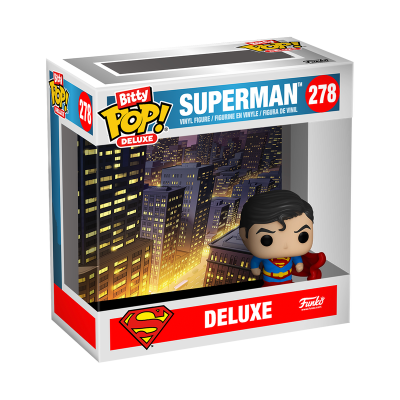 Figura de vinil Bitty Pop Deluxe de Superman em caixa com fundo de cidade à noite.