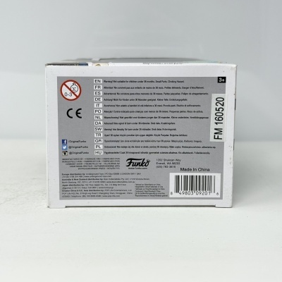 Caixa branca Funko com texto multilíngue, código de barras e referência, sobre fundo cinzento