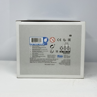 Embalagem branca e cinza com texto multilíngue e símbolos de reciclagem.