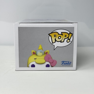 Caixa de Funko Pop com imagem de unicórnio amarelo e texto POP!