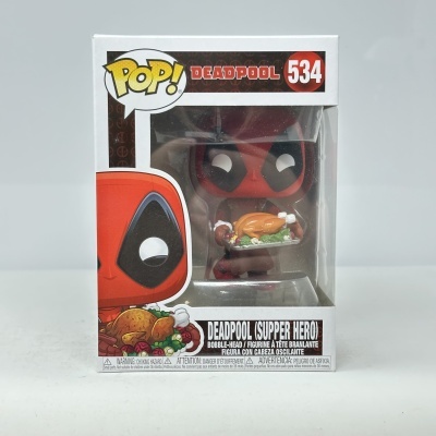 Funko Pop! Deadpool (Supper Hero) 534 em caixa com figura a segurar peru assado