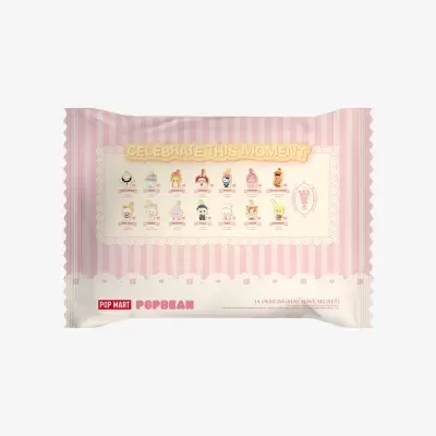 Embalagem riscada rosa e branco com bonecos coloridos e texto dourado