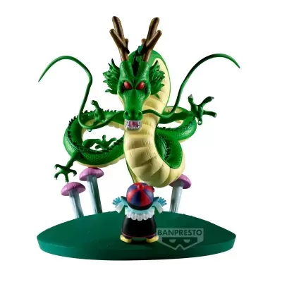 Figura de dragão verde e pequena figura humana numa base verde com cogumelos