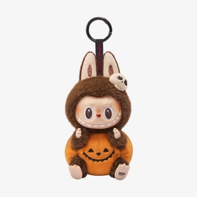 Porta-chaves peluche monstro fato laranja com rosto abóbora e orelhas castanhas