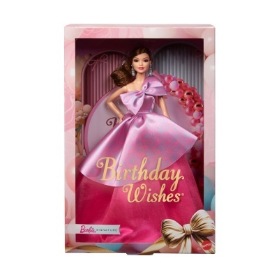 Boneca Barbie com vestido rosa na embalagem com texto Birthday Wishes
